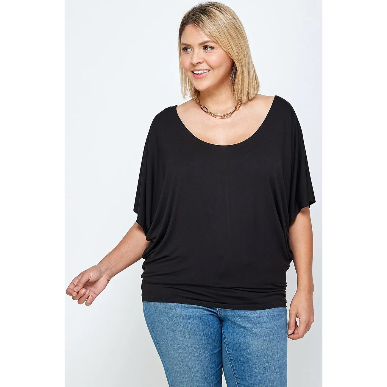 Solid Knit Women's Top With A Flowy Silhouette