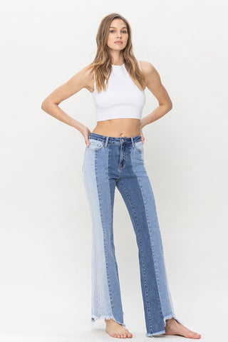 High Rise Relaxed Flare Jeans With Uneven Raw Hem