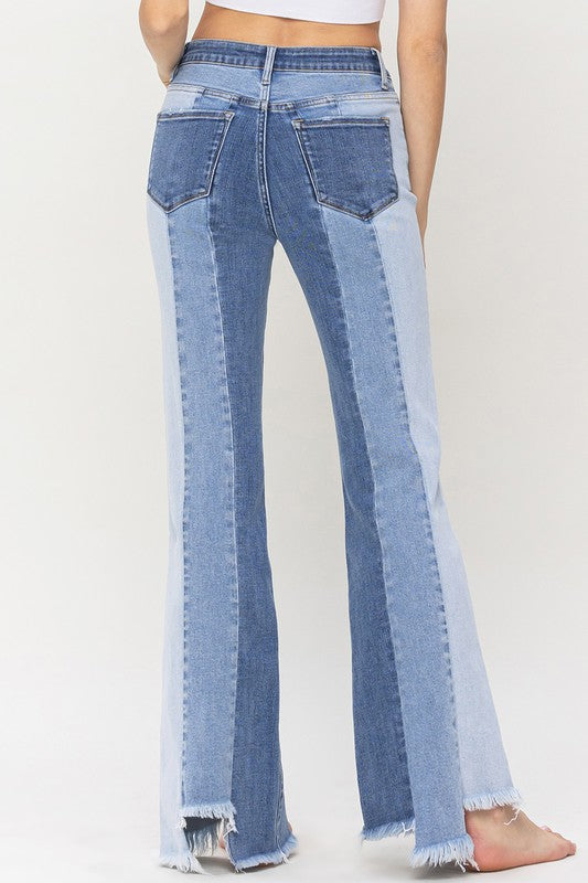 High Rise Relaxed Flare Jeans With Uneven Raw Hem