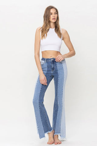 High Rise Relaxed Flare Jeans With Uneven Raw Hem