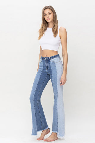 High Rise Relaxed Flare Jeans With Uneven Raw Hem