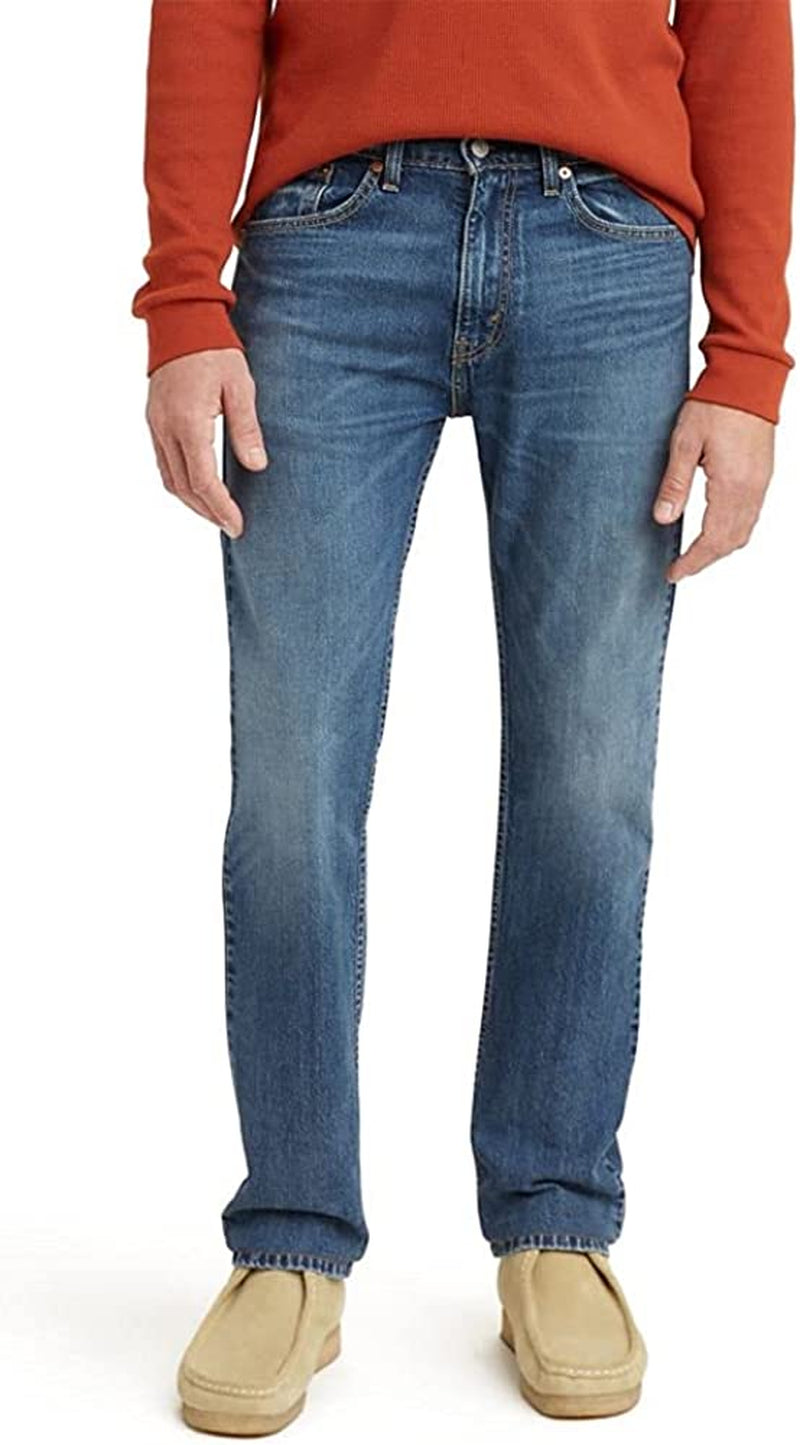 Cotton Levi's jeans in blue. Five-pocket styling. Zip-fly. Belt loops at waistband. 