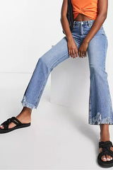 Flare Straight Leg Jeans With Raw Hem Edge in Light Blue