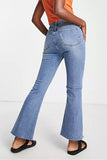 Flare Straight Leg Jeans With Raw Hem Edge in Light Blue