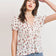 products/IVORY-BLUSHFLORAL-FRONT-TIE-WAFFLE-PEPLUM-TOP.jpg