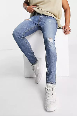Ripped Jeans Skinny in Mid-Blue Wash With Distressing