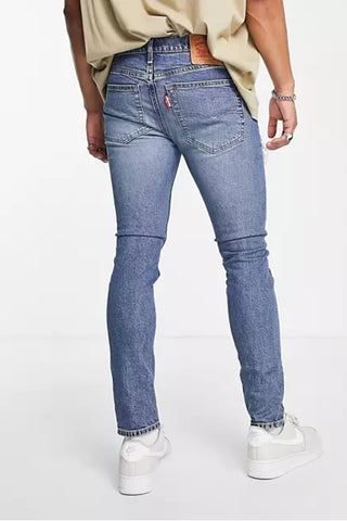 Ripped Jeans Skinny in Mid-Blue Wash With Distressing